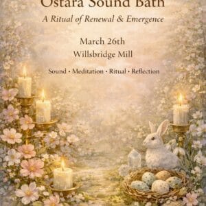Themed sound bath with candles, flowers, and a rabbit for renewal and gentle becoming.