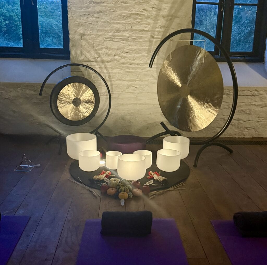 Goddess Haven sound healing space featuring crystal singing bowls and meditation decor for relaxation and energy balancing.