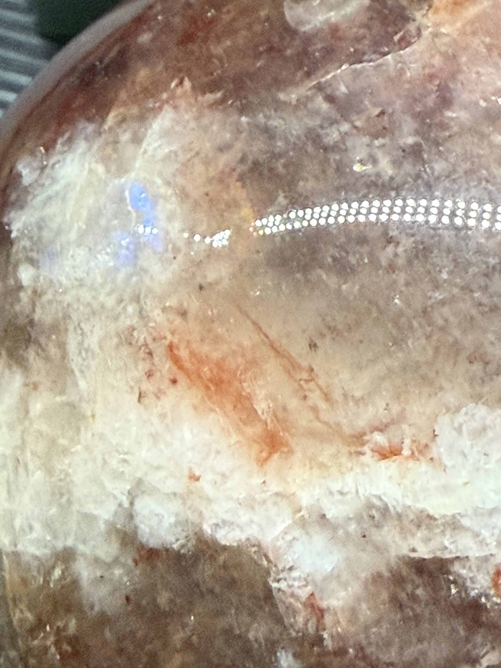 Crystals on the surface of a healing purpose crystal, showcasing natural mineral formations used in holistic therapy and energy healing.