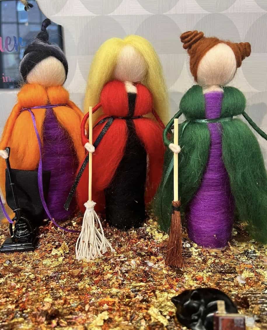 Handcrafted witch dolls with vibrant costumes and brooms, perfect for Halloween decor or as unique gifts. Featuring detailed designs and colorful outfits.